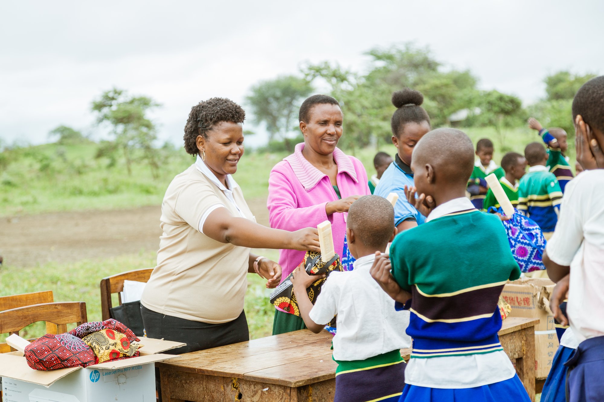 Handling the Menstrual Kits to the Girls at Lerai primary School